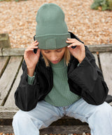Deep-cuffed tonal patch beanie — lifestyle