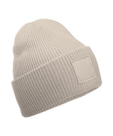 Deep-cuffed tonal patch beanie — Natural Stone