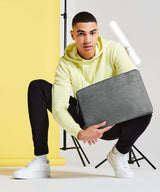 Essential 15 laptop case" — lifestyle