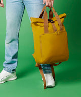 Recycled twin handle roll-top laptop backpack — lifestyle