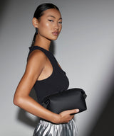 Matte PU accessory pouch — lifestyle