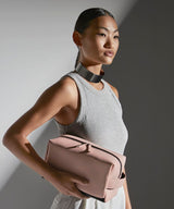 Matte PU toiletry/accessory case — lifestyle