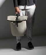 Matte PU rolltop backpack — lifestyle