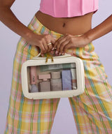 Boutique clear window travel case — lifestyle
