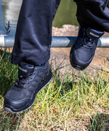 All-black safety trainer — lifestyle