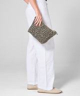 Leopard print canvas accessory bag — lifestyle